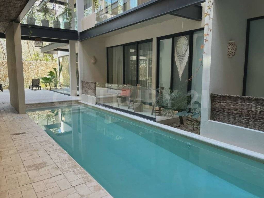 Moderno departamento en Tulum con balcón selva 3