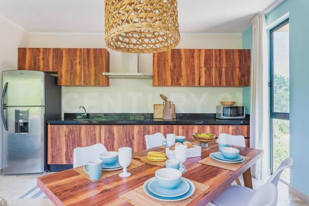 Moderno departamento con terraza en Aldea Zama 5