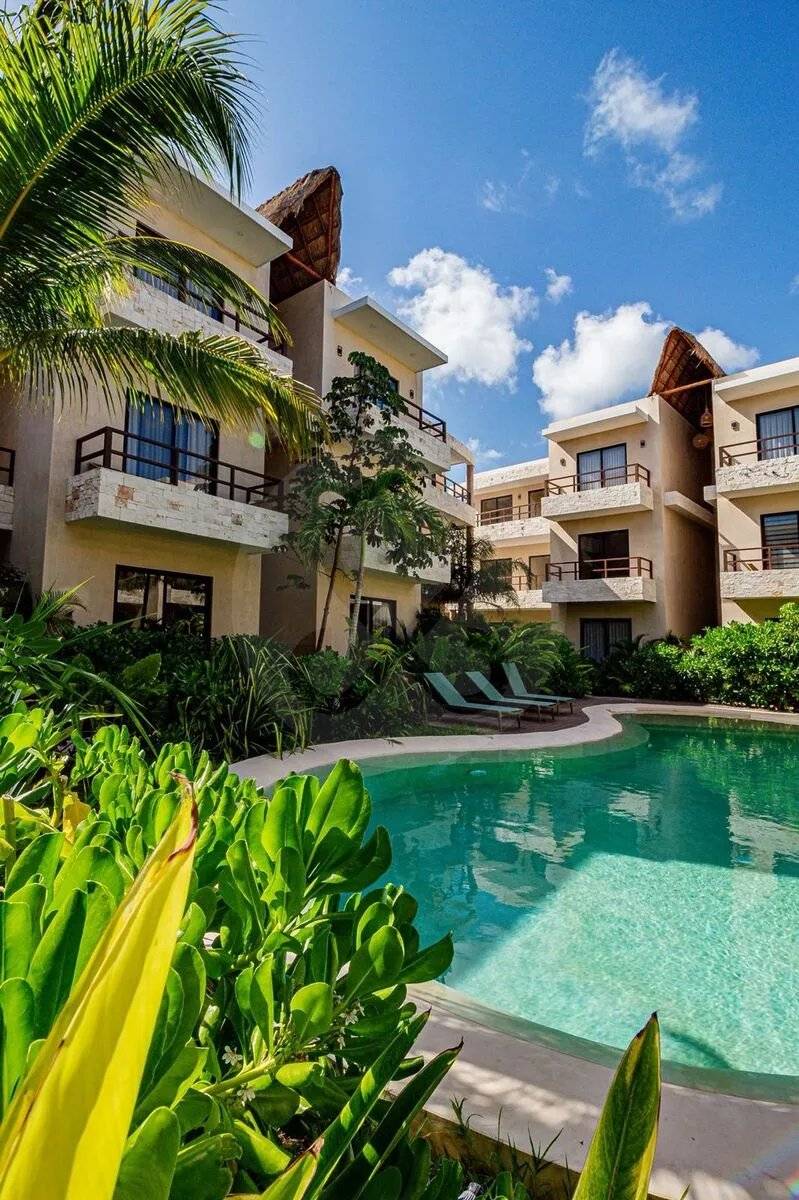 Departamento ideal en Tulum con alberca y jardín 1
