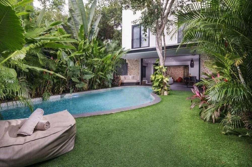 Villa de lujo con alberca y jardín en Tulum 3