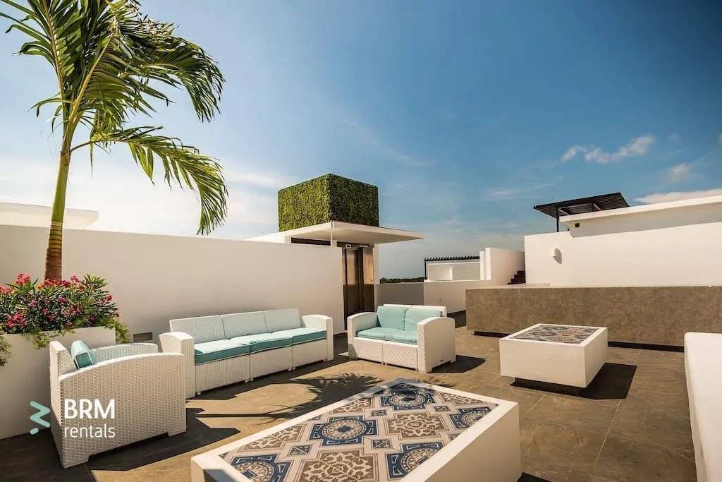 Moderno departamento con rooftop y piscina 2