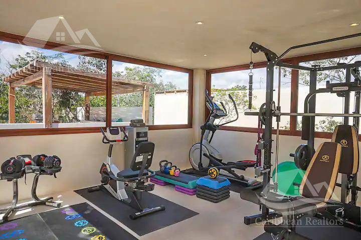 Villa de lujo con rooftop y dos piscinas en Tulum 4
