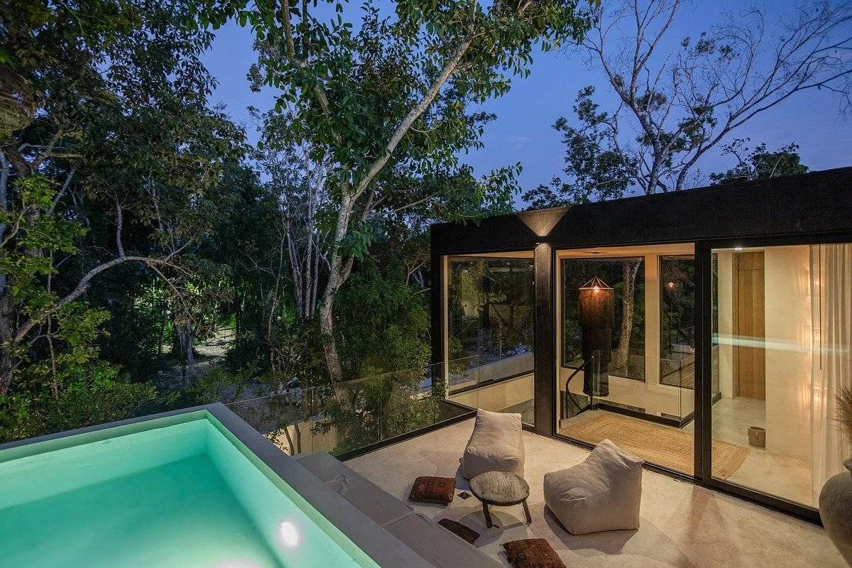 Villa minimalista con piscina y vistas a la jungla 4