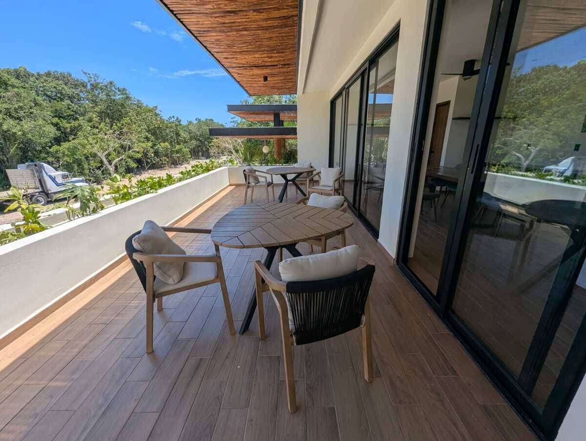 Jardín con alberca privada en Canopia 110 4