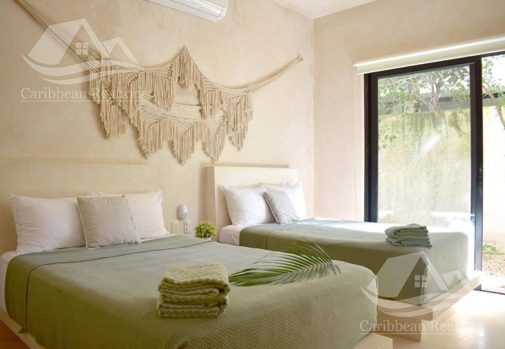 Exclusivo departamento con jardín y alberca en Tulum 2