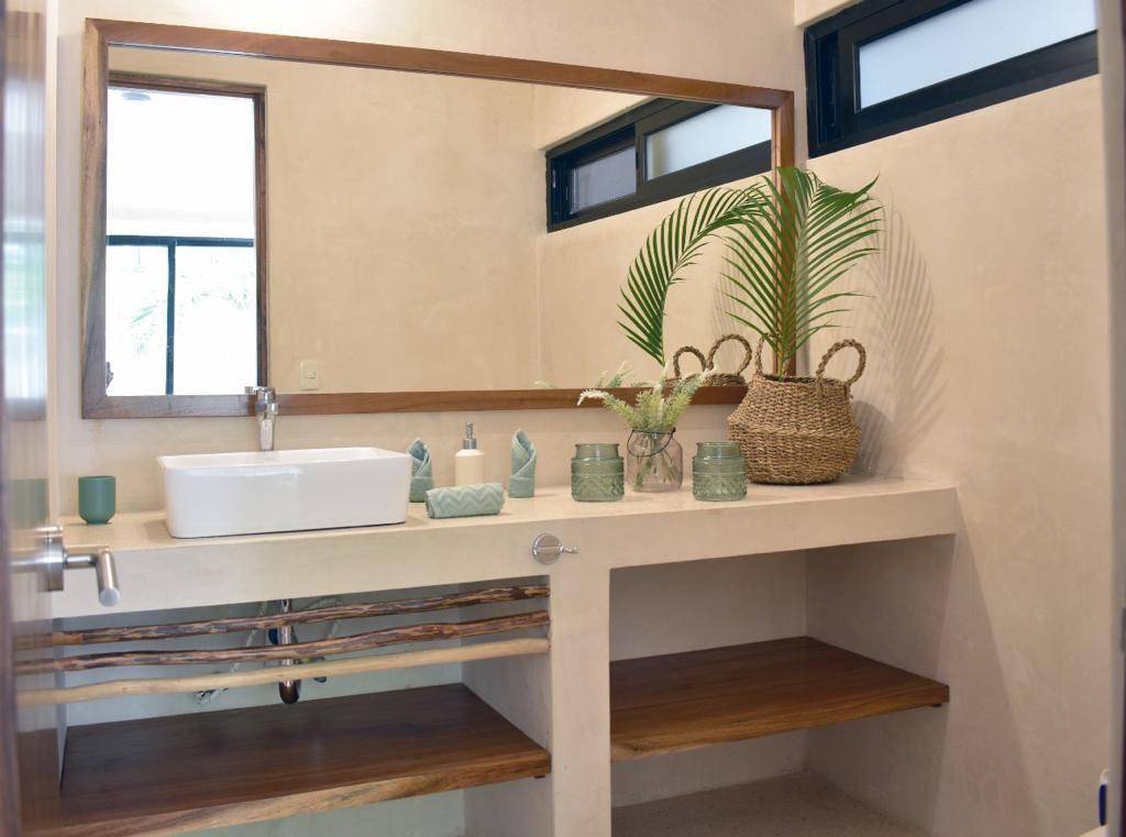 Exclusivo departamento con jardín y alberca en Tulum 3